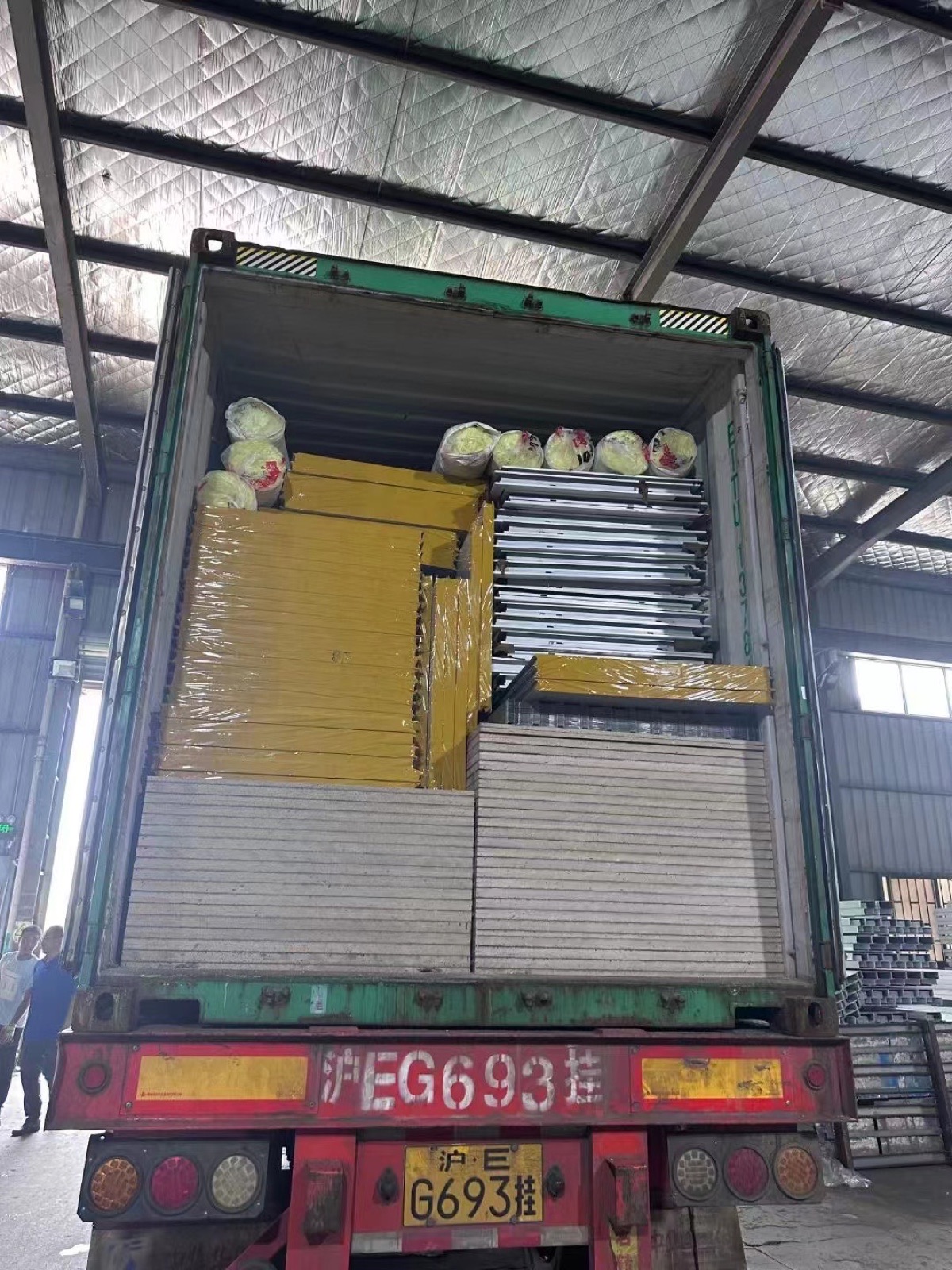 Modular house components loaded for delivery
